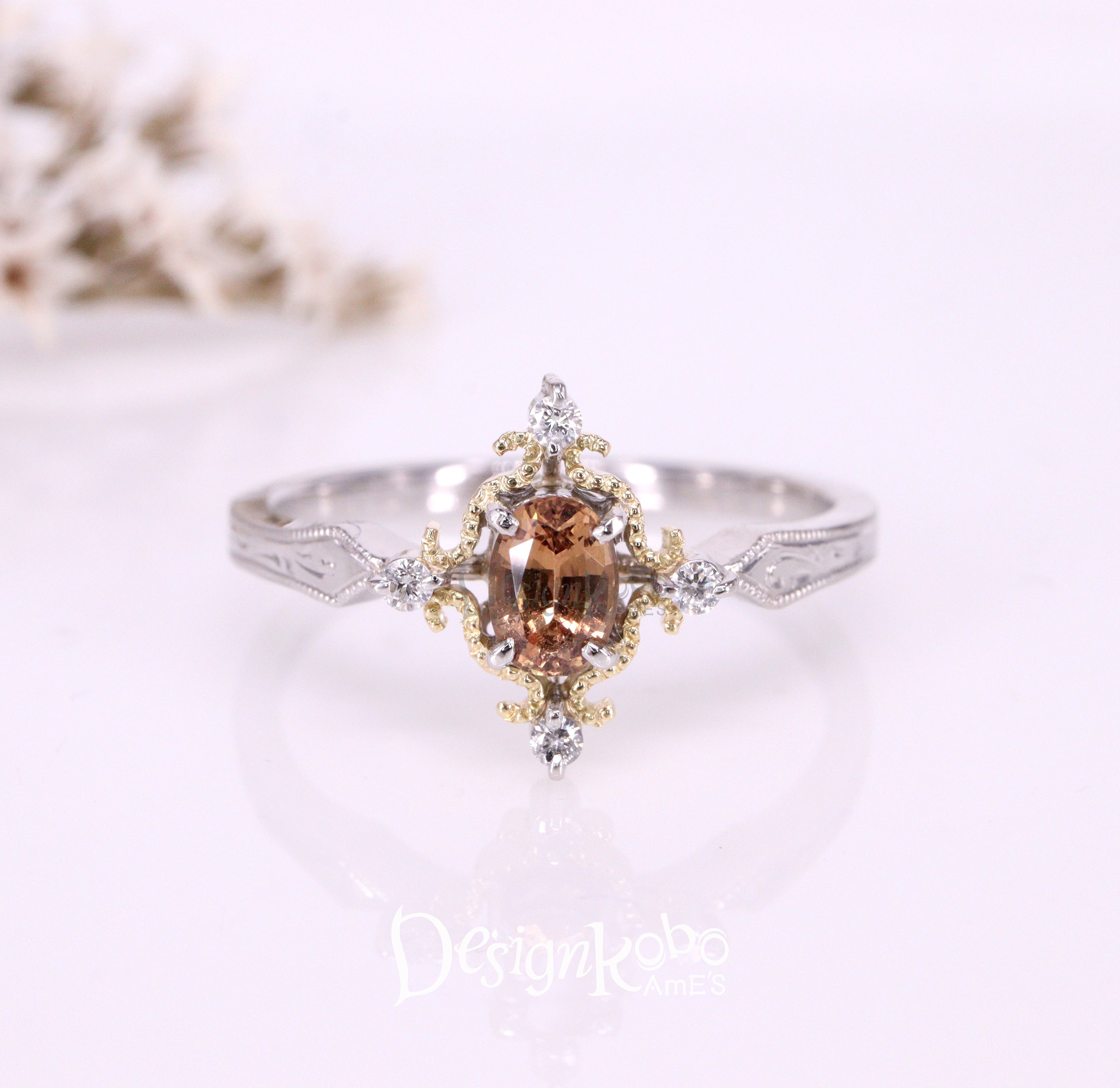 Dame(デイム)リング − 王女の勲章<br>ノンヒートパパラチアサファイア K18/Ptリング