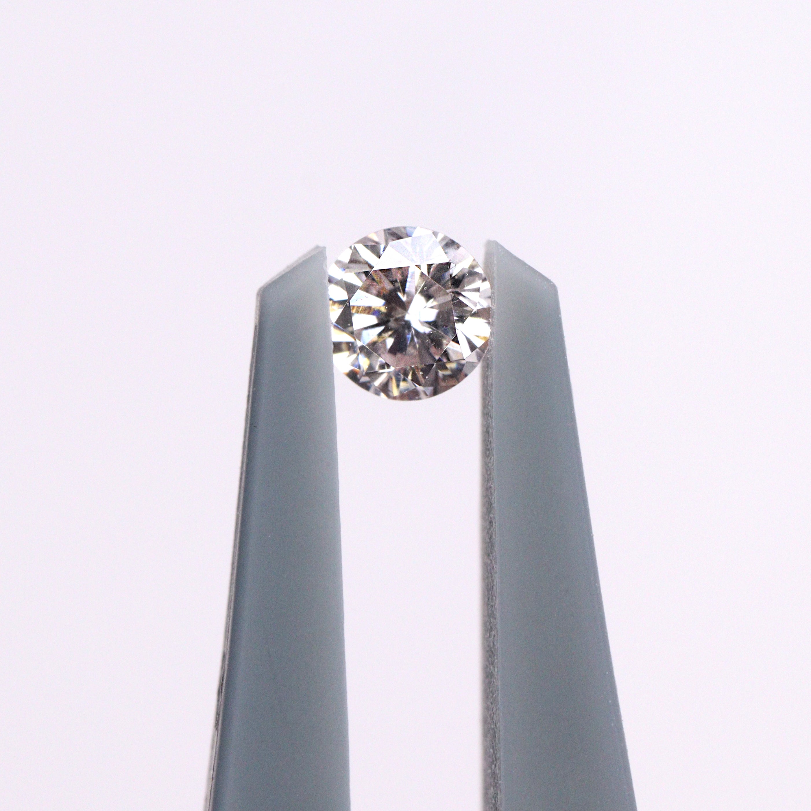 ピンクダイヤモンド<BR>very Light orangy pink<BR>0.088ct