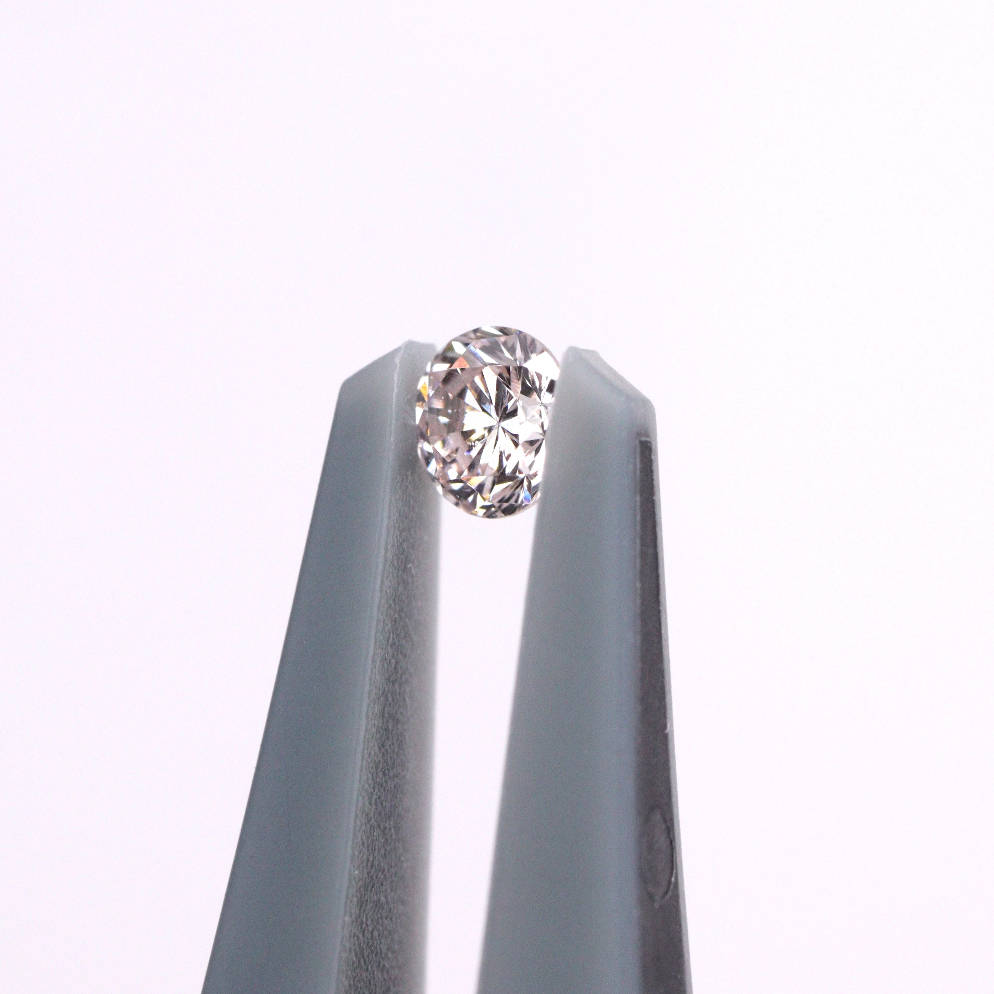ピンクダイヤモンド<BR>very Light orangy pink<BR>0.088ct