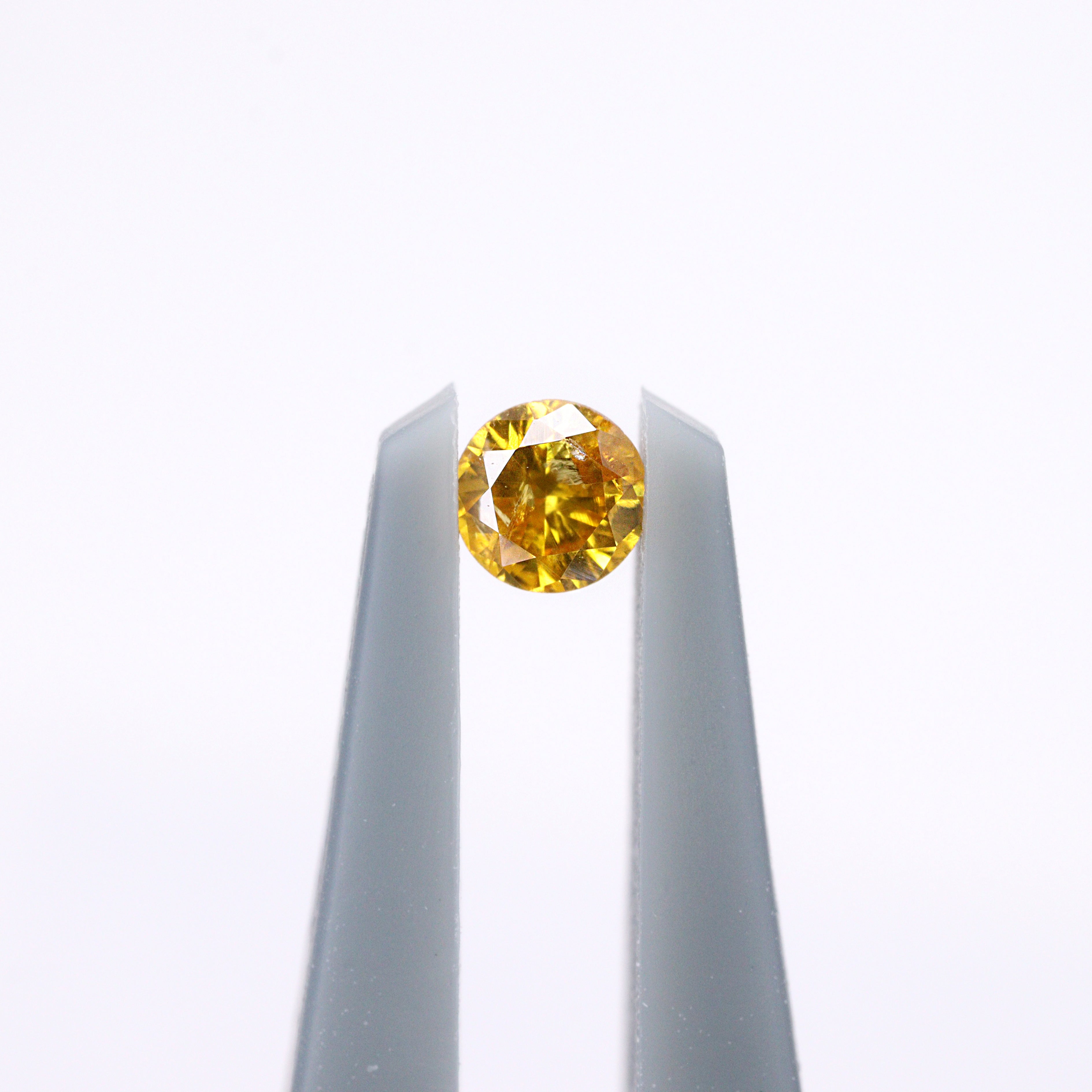 イエローダイヤモンド<BR>0.066ct