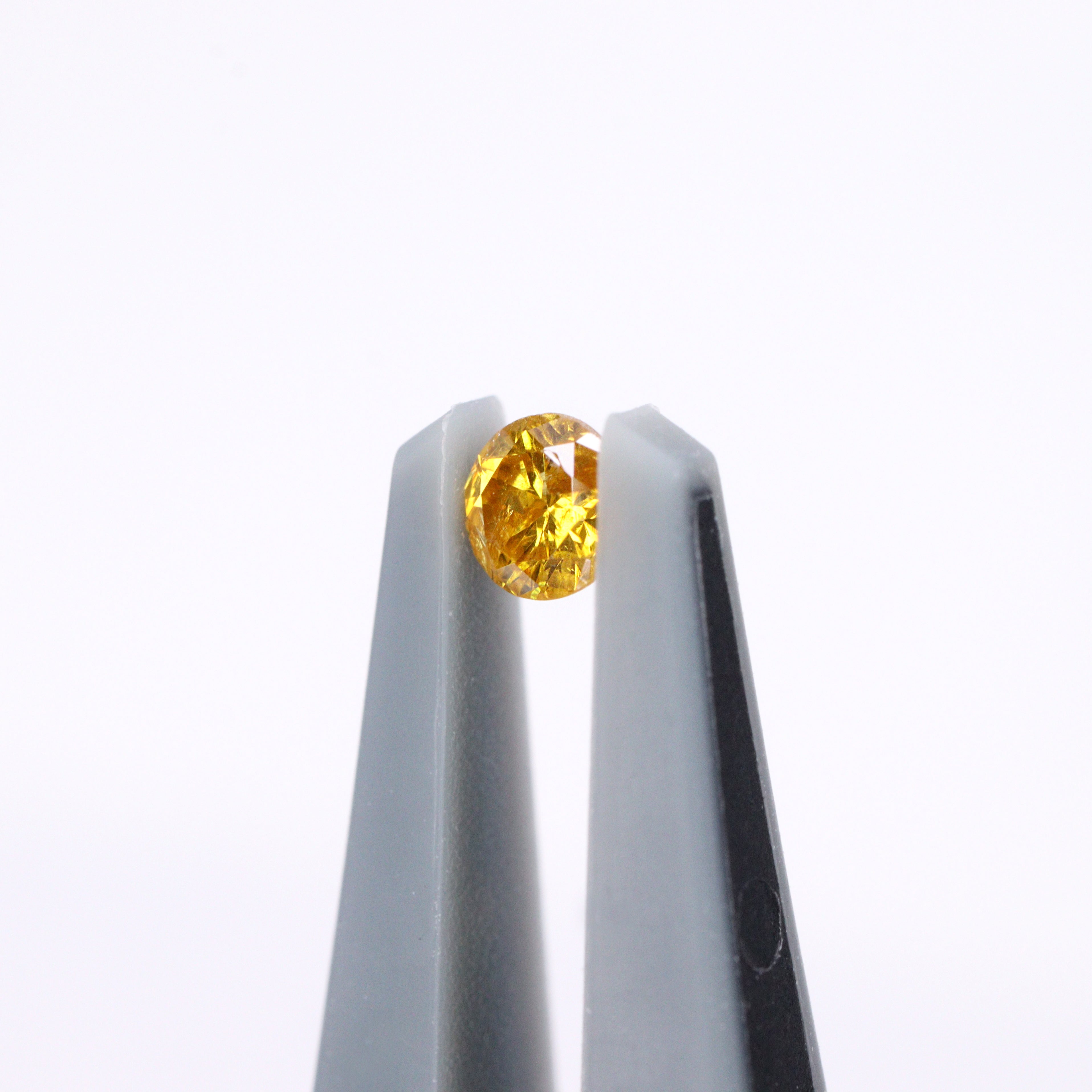 イエローダイヤモンド<BR>0.066ct