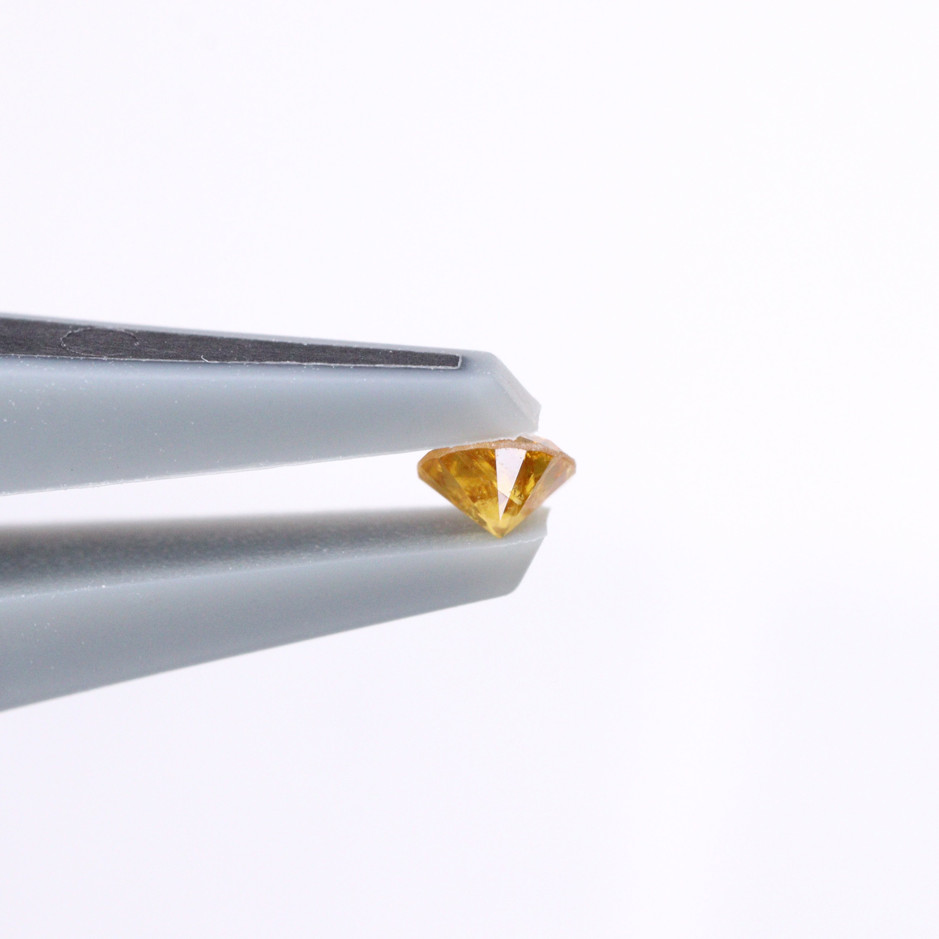 イエローダイヤモンド<BR>0.066ct